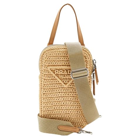 prada raffia cross body|Prada raffia bag.